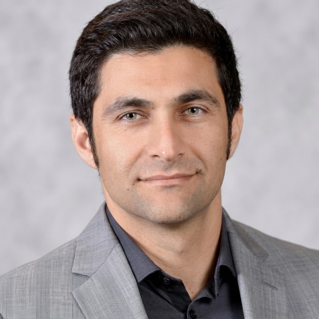 Dr. Amir Zavichi, civil engineer and construction management professional affiliated with ConcreteCalculate
